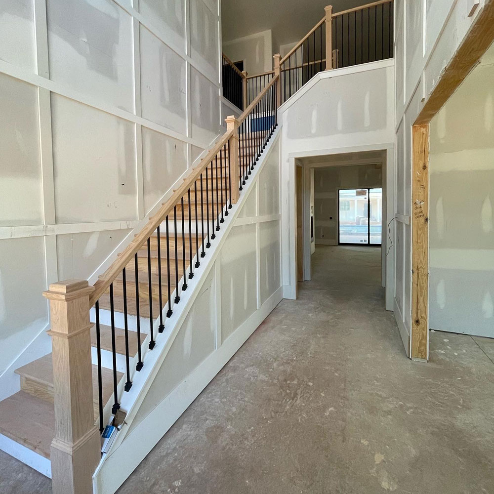 Custom staircase detail showing ICG craftsmanship